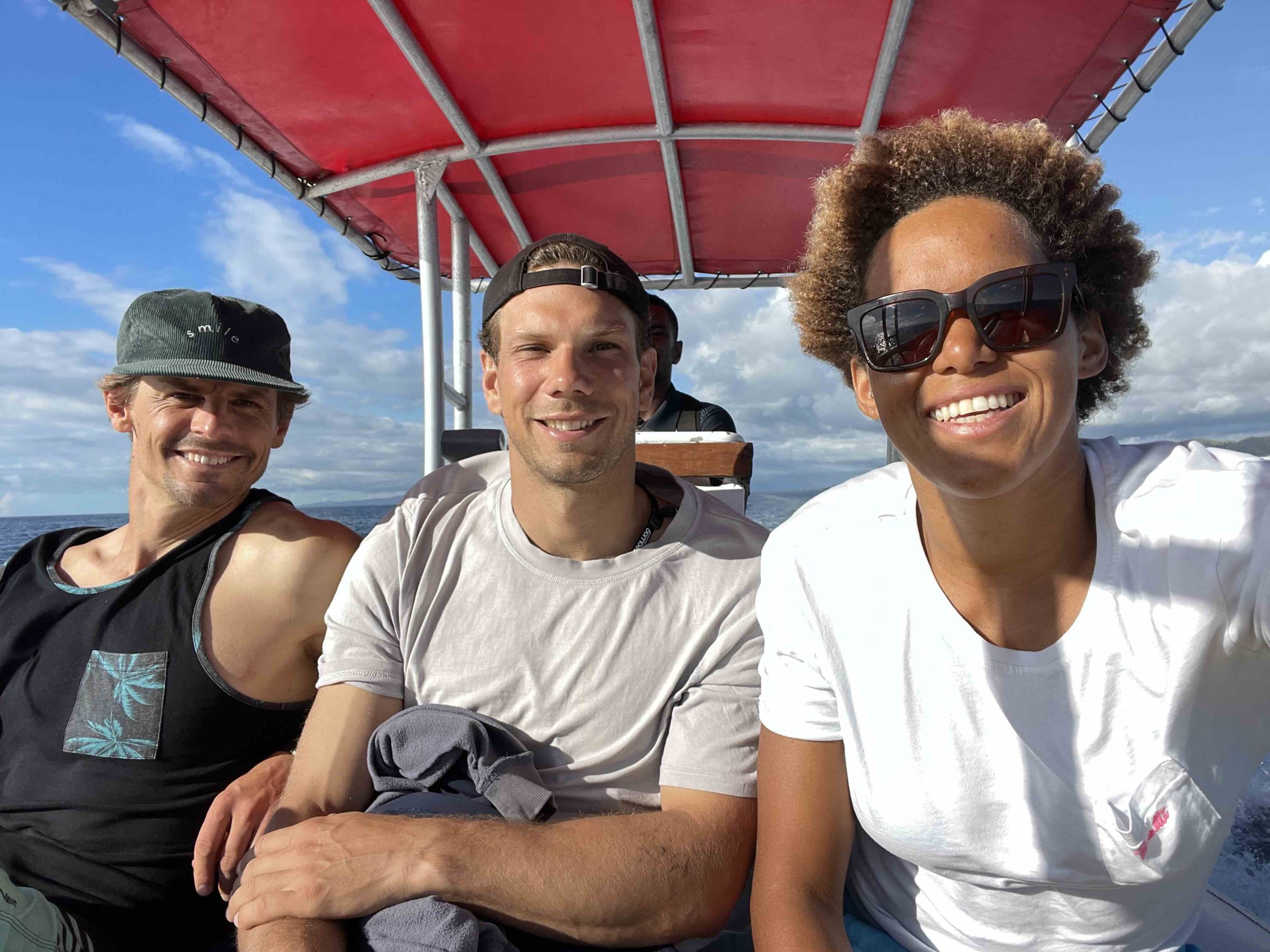 Flo, Sarah-Quita and Leon in the boat off to Cloudbreak